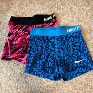 2 pairs of Nike pro spandexs